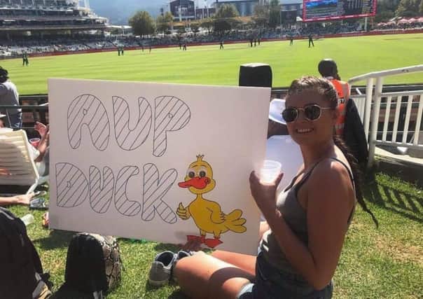 Kathryn Hardy of Sutton with her Ay up me duck banner at the South Africa v Sri Lanka cricket match at Cape Town South Africa.