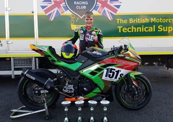 Mansfields Lewis Jones with his 151s-backed Ninja 300 bike and the trophies he won at Brands Hatch.