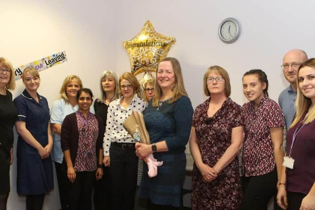 Dr Susan Huggard, centre, with her colleagues at Rainworth Health centre.