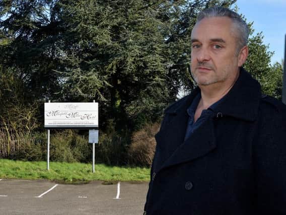 Resident Adrian Marson is calling for better signage.