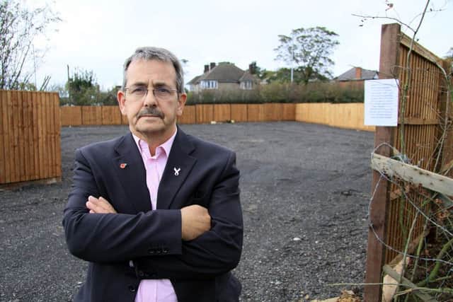 NEAABE111012c1, Councillor Robert Sears Piccavey at the travellers site on the greenebelt field, Underwood.