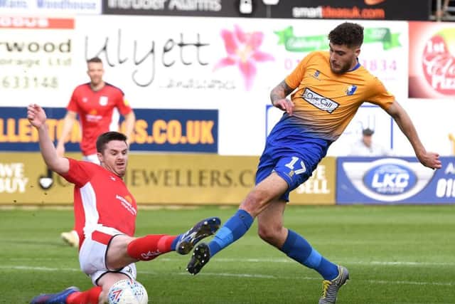 Picture Andrew Roe/AHPIX LTD, Football, EFL Sky Bet League Two, Mansfield Town v Crewe Alexandra, One Call Stadium, 23/03/2019, K.O 3pmMansfield's Ryan Sweeney has his shot blocked by Crewe's Eddie NolanAndrew Roe>>>>>>>07826527594