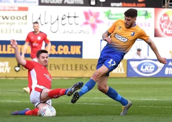 Picture Andrew Roe/AHPIX LTD, Football, EFL Sky Bet League Two, Mansfield Town v Crewe Alexandra, One Call Stadium, 23/03/2019, K.O 3pm

Mansfield's Ryan Sweeney has his shot blocked by Crewe's Eddie Nolan

Andrew Roe>>>>>>>07826527594