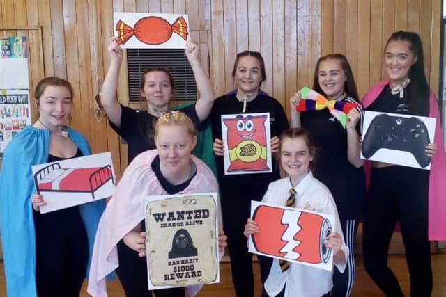 Performing arts students from West Nottinghamshire College in costume for their healthy lifestyle play.