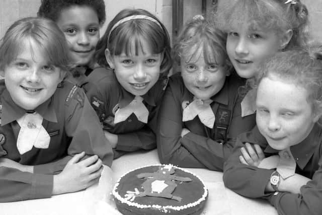 1989: These smiley Brownies from Skegby celebrate with cake at their 75th anniversary gala. Do you recognise anyone?