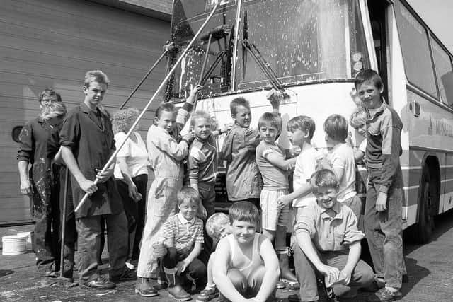 1990: Big Barn Lane Scouts show us how its done while scrubbing down this bus. Did you take part in this?