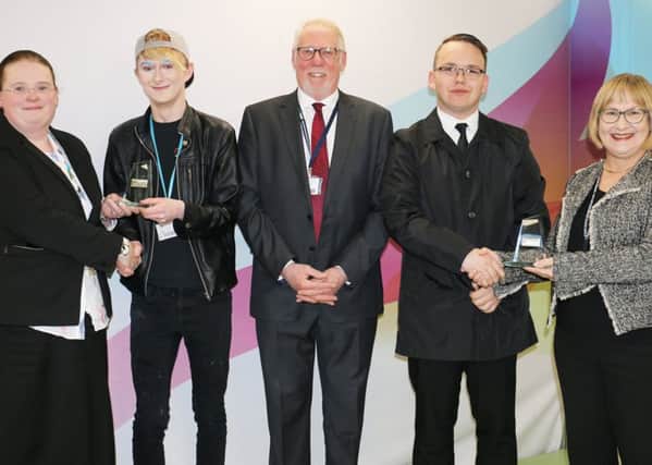Judges and winners from West Nottinghamshire College's Student FIRST competition, from left: Jane Hawksford (governor), Same Fearn, Sean Lyons (chairman of governors), Michel Jasozewski, Rebecca Joyce (governor).