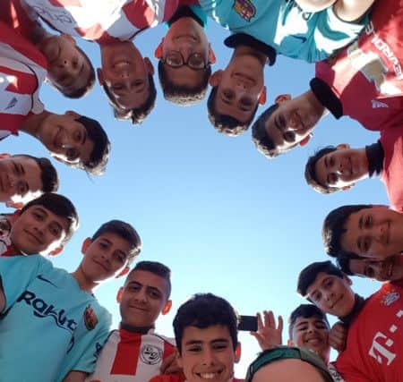 Darley Dale resident Mark Daly donated a huge collection of old football kits to Palestinian children when he visited a refugee camp in the West Bank recently.