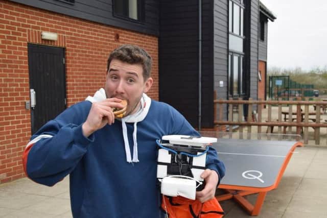 Tom with the burger - taken by Colchester United