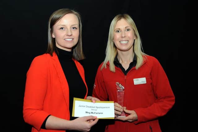 Ashfield Community Awards.      
Rebecca Phillips, right, from Everyone Active, accepts the Junior Disabled Sportsperson award on behalf of Meg McFarlane from Chloe O'Donnell.