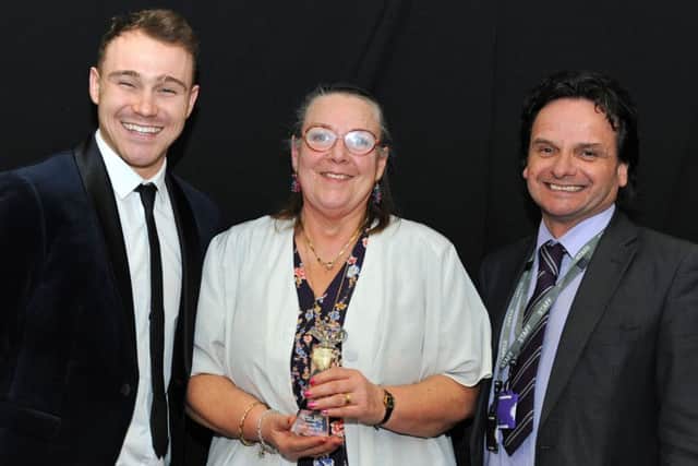 Ashfield Community Awards.      
Carol Bostock picks up her Change 4 Life Award from Simon Martin, right, also pictured is event host Ollie Hynd.