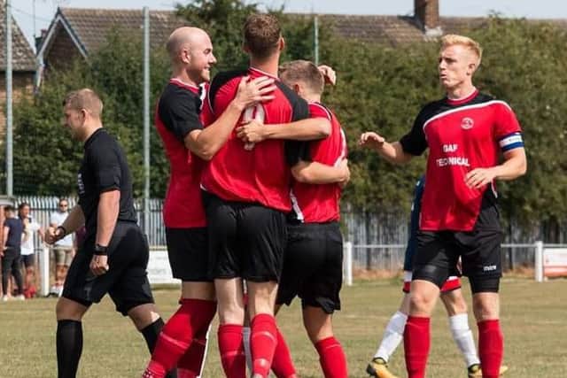 Ollerton players celebrate Sam Strettons goal in the defeat at Dronfield.