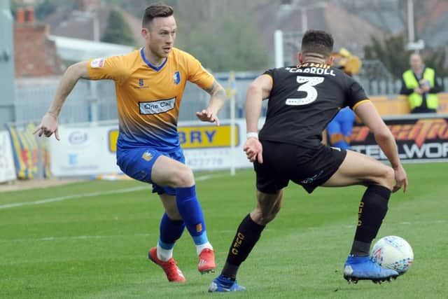 Gethin Jones takes on Jake Carroll in the first half.