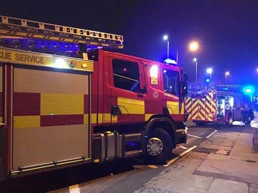Firefighters at the scene.