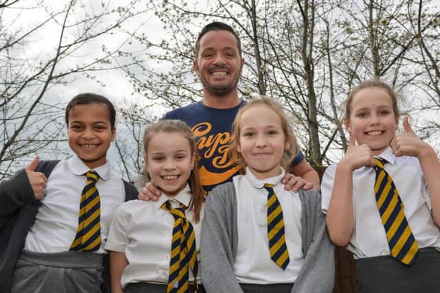 Mark with daughter Millie Wheeler, 10 and her friends Melissa Gogo, 10, Charlotte Kyslanova, 10 and Zara Watson, nine