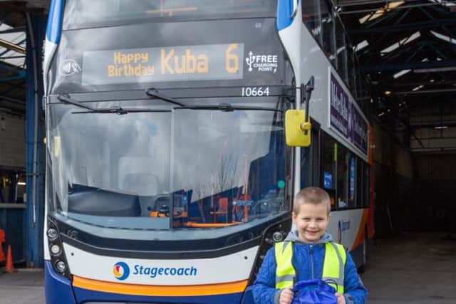 Bus-mad Kuba Jedrusiak-Murzyn was treated to a tour of the Mansfield bus depot