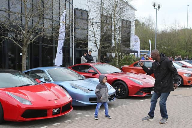 Sports cars lined up at the meet