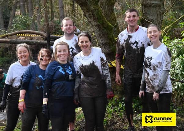 Staff from Specsavers in  Sutton-in-Ashfield who took part in the X-Runner Wild Mud Run, from left: Emilie Simpson, Lisa Carlin, Natalie Ayre, Anthony Smith, Sarah Mehmet, Ben Cartledge, Katie Lewis.