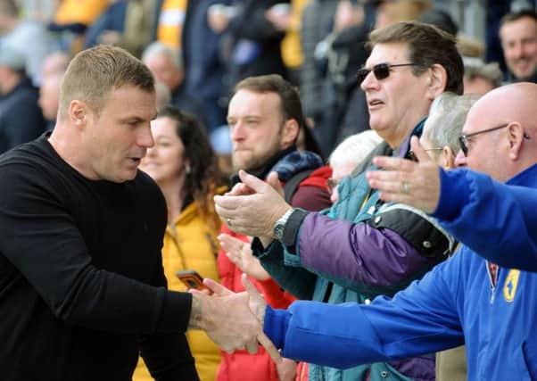 Mansfield Town v Cambridge Utd.
David Flitcroft is greeted by fans.