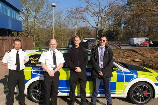 Officers at Nottinghamshire Police HQ with the new dog car.