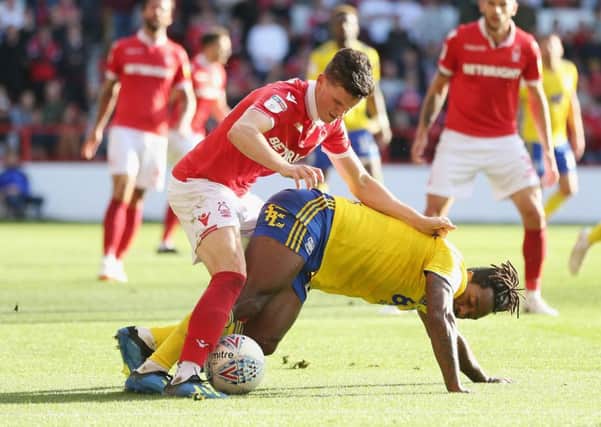 NOTTINGHAM, ENGLAND - AUGUST 25: Sam Byram of Nottingham Forest and Jacques Maghoma of Birmingham during the Sky Bet Championship match between Nottingham Forest and Birmingham City at City Ground on August 25, 2018 in Nottingham, England.  (Photo by Alex Morton/Getty Images)