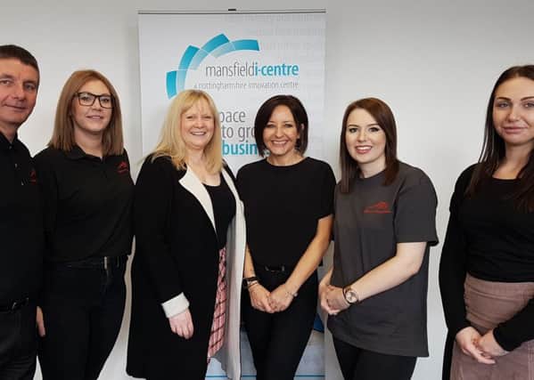 Adina Worboys (centre right) with members of her team and Sally Wharton, manager of the Mansfield i-Centre (centre left).