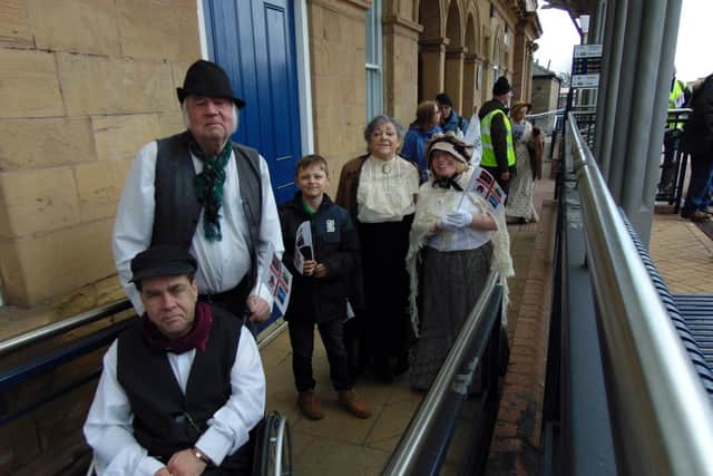 Marchers reach Mansfield Railway Station.