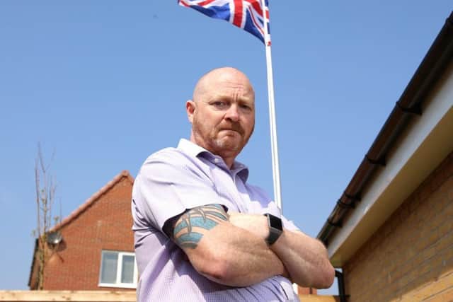Andrew Smith installed the flag on a pole in tribute to Great Britain after serving six years in the Royal Signals.