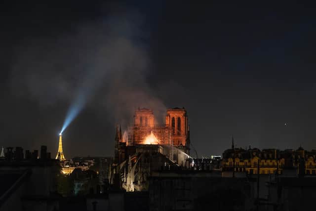 Smoke and flames rise from Notre-Dame Cathedral on April 15, 2019.