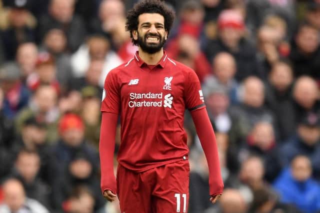 LIVERPOOL, ENGLAND - APRIL 14:  Mohamed Salah of Liverpool reacts during the Premier League match between Liverpool FC and Chelsea FC at Anfield on April 14, 2019 in Liverpool, United Kingdom. (Photo by Michael Regan/Getty Images)