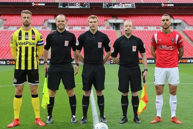 David Hunt (second left) with the other officials and the two team captains at Wembley on Saturday.