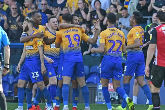 Picture Andrew Roe/AHPIX LTD, Football, EFL Sky Bet League Two, Mansfield Town v Morecambe, One Call Stadium, 19/04/2019, K.O 3pmMansfield's players celebrate Jacob Mellis' goalAndrew Roe>>>>>>>07826527594