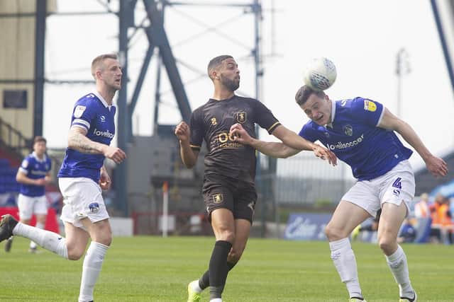 Mansfield Town suffered a disappointing defeat at Oldham this afternoon.