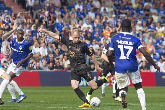 Match action from Mansfield's 3-2 defeat at Oldham.