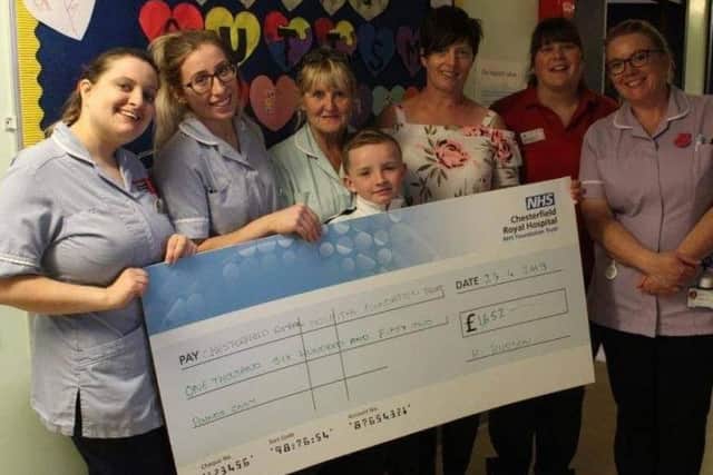 Hayden Hudson with his mum Tracey and staff at the Nightingale Ward at Chesterfield Royal Hospital.