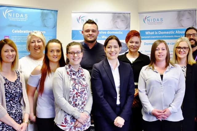 Mansfield MP Ben Bradley with Vicky Atkins MP, domestic abuse minister, and  staff at NIDAS