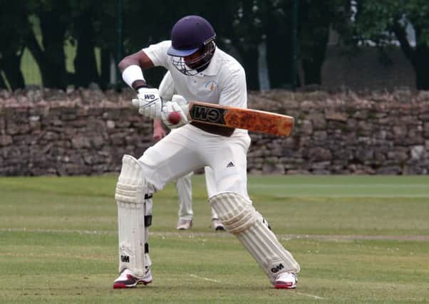 Anuk Fernando opens the face for a stylish shot on his way to 167no for Mansfield Hosiery Mills.