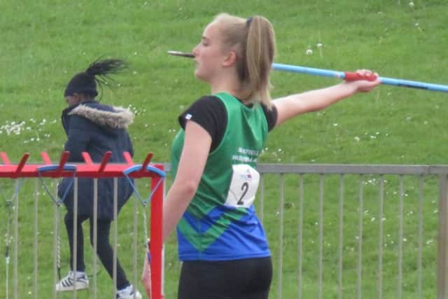 Serenity Joynt, who broke a championship record in the shot and also won the javelin.