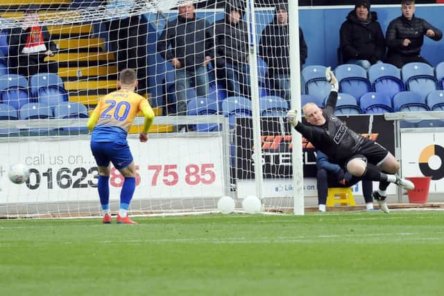 Conrad Logan is beaten as the Stags go behind in the second half.