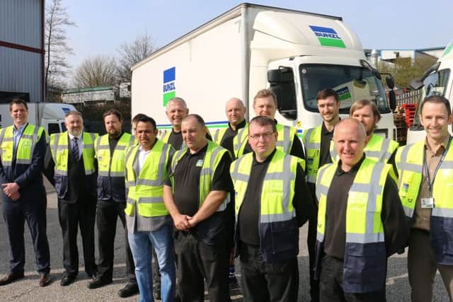 Participants of the BCS Driver Academy scheme pictured outside the firms Mansfield branch with national transport manager Phil Haskew (first left) and HR manager Richard Gray (second left), and Nick Maidment, from West Nottinghamshire College (first right).