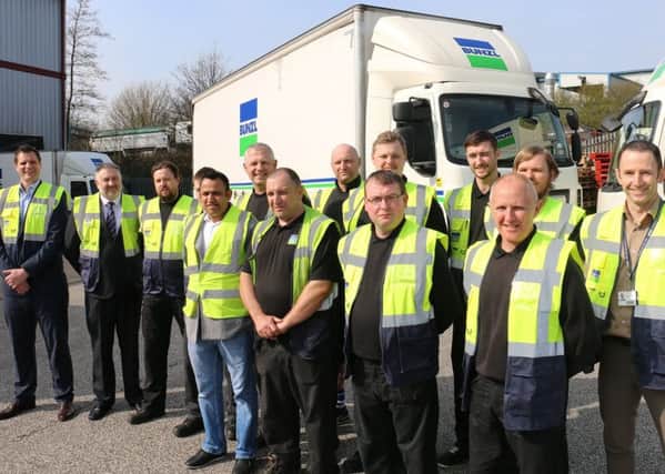Participants of the BCS Driver Academy scheme pictured outside the firms Mansfield branch with national transport manager Phil Haskew (first left) and HR manager Richard Gray (second left), and Nick Maidment, from West Nottinghamshire College (first right).