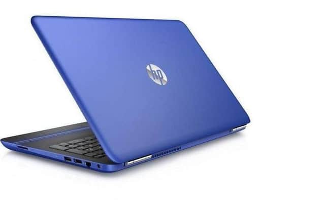 A laptop similar to the one pictured was swiped.