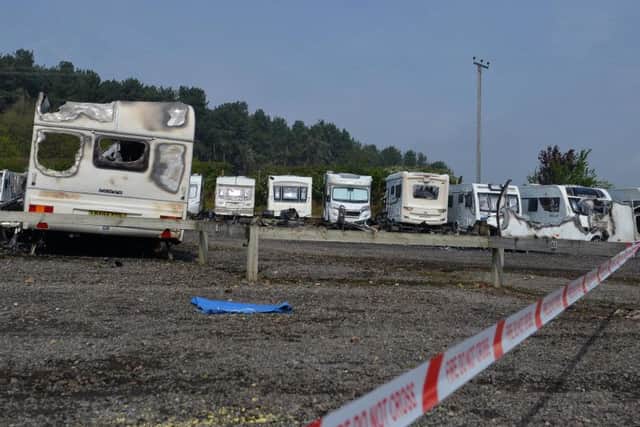 Over 100 caravans have been destroyed or damaged in the fire