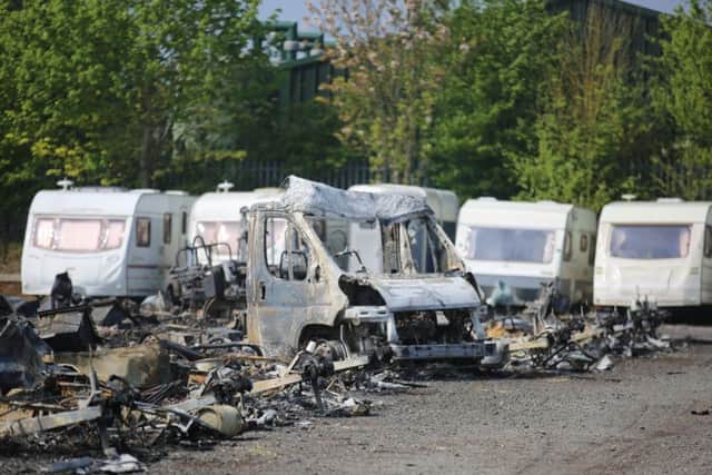 Numerous caravans and motorhomes that have been burnt out following a fire at a storage site in Blidworth, Nottinghamshire.  April 30, 2019.  See SWNS story SWMDblaze.  Emergency services were called out after the incident was reported around 2am, on Tuesday, April 30.  Nottinghamshire Fire and Rescue Service said as many as 70 caravans, motorhomes and horses boxes were destroyed by the flames, with a further 50 caravans damaged by the heat.  Six Nottinghamshire fire crews attended the scene for around five hours.  The incident happened at a site off the A614 in Blidworth, between Haywood Oaks and Baulker Lane.