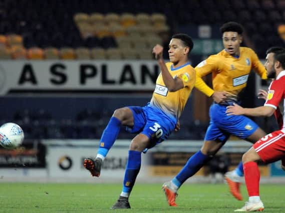 Alistair Smith in action for Mansfield Town.