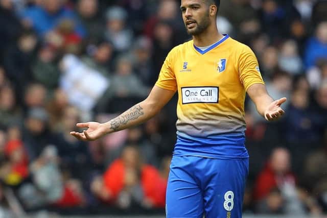 Jacob Mellis at MK Dons on a bad day at the office for Stags.