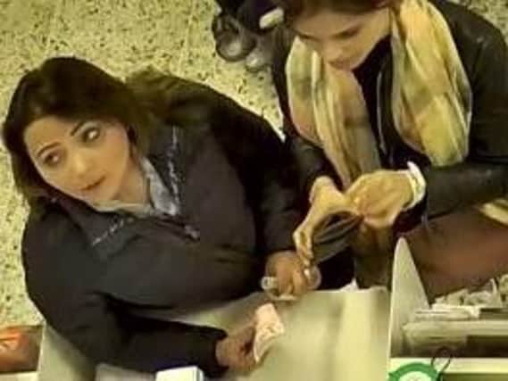 The two women were captured on CCTV.