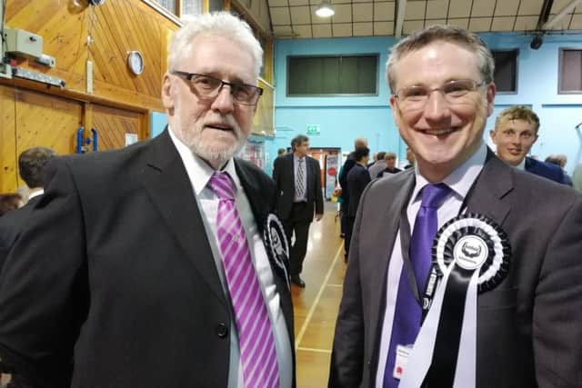 Councillor Tony Brewer, chairman of the council, with Coun Matthew Relf - who secured the biggest majority of the evening.