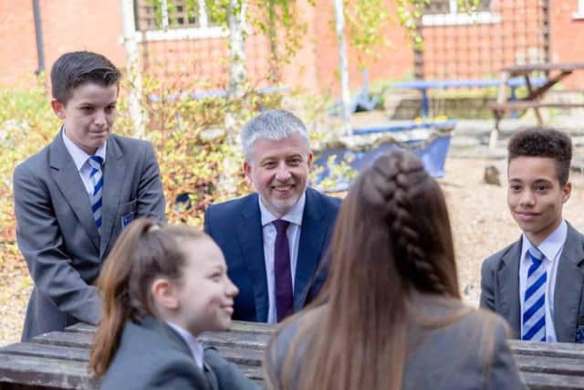 Pupils with headteacher Paul Halcro