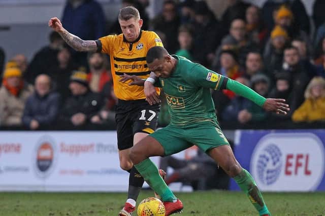Picture by Gareth Williams/AHPIX.com; Football; Sky Bet League Two; Newport County v Mansfield Town; 9/2/2019 KO 15.00; Rodney Parade; copyright picture; Howard Roe/AHPIX.com; Mansfield skipper Krystian Pearce wrestles with Newport's Scot Bennett